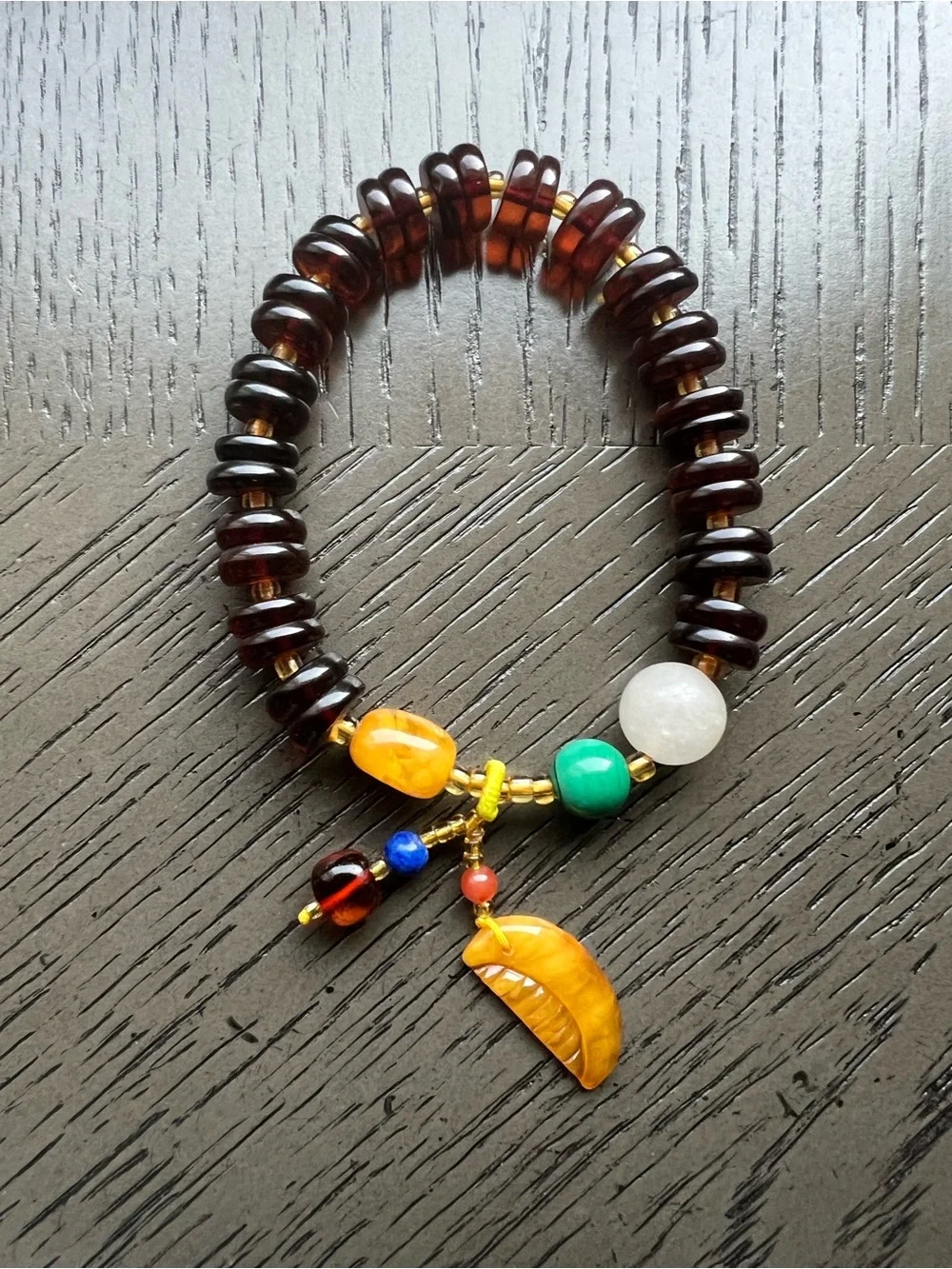 Blood Amber donut bracelet with charm 9mm SIZE 6.5’
